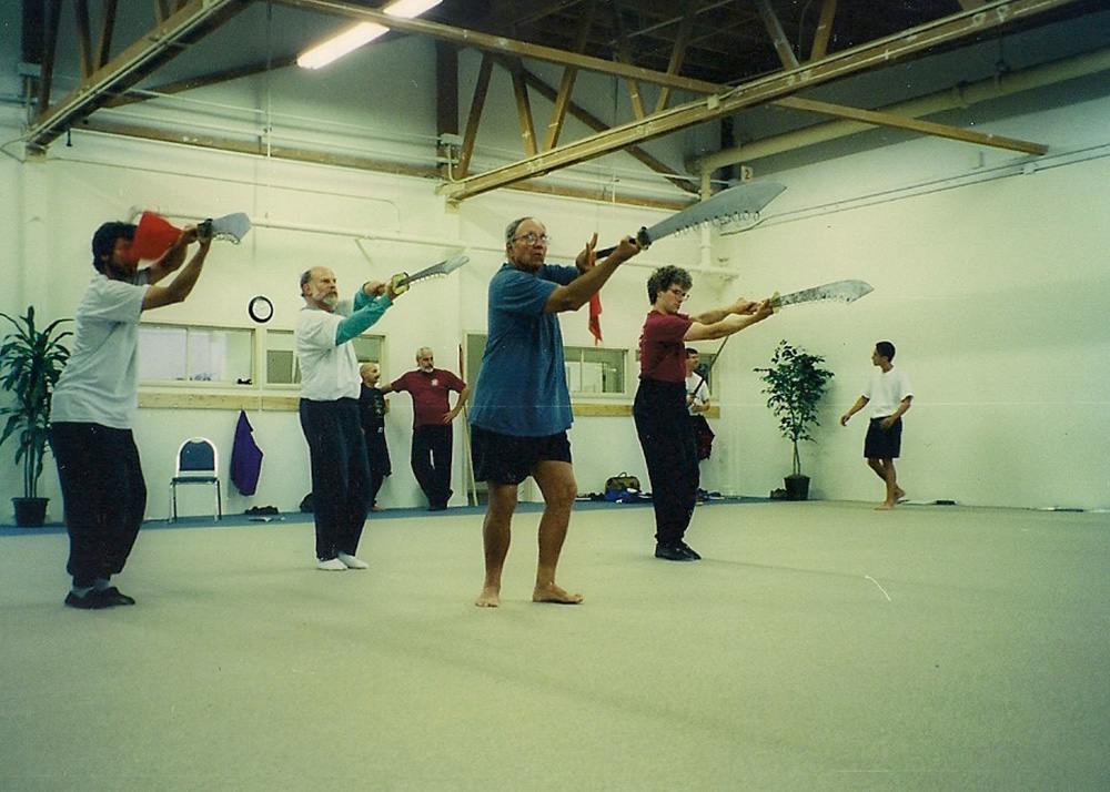 Class practicing with nine-ring broadsword